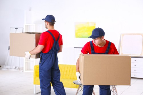 Moving van and boxes beside Clapham residential property