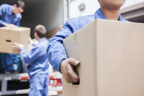 Movers preparing boxes and equipment for a safe relocation