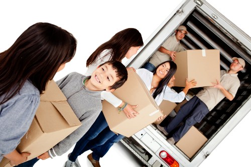Specialist team handling piano removals in a Clapham home