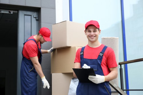 Professional house removalists in Clapham loading furniture into a moving van