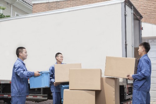Removal van loading furniture during a house removals service in Clapham