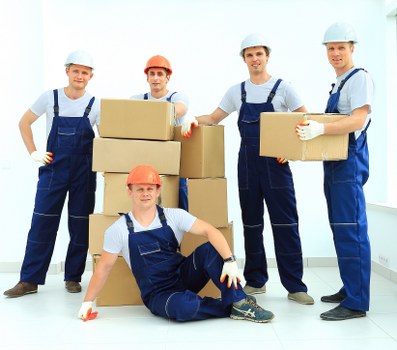 Removal van carrying boxes and furniture for a flat move in Clapham