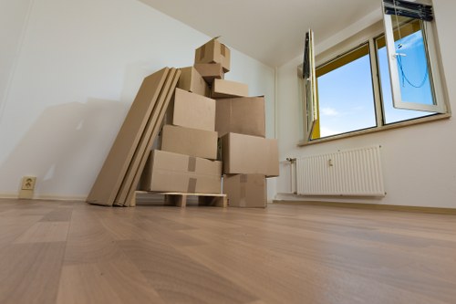 Movers Clapham team sorting recyclable packing materials during a move
