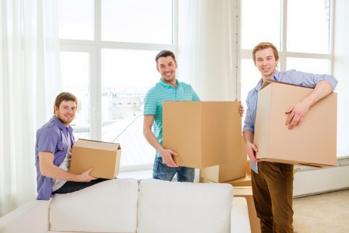 Packed household items ready for loading onto a moving vehicle