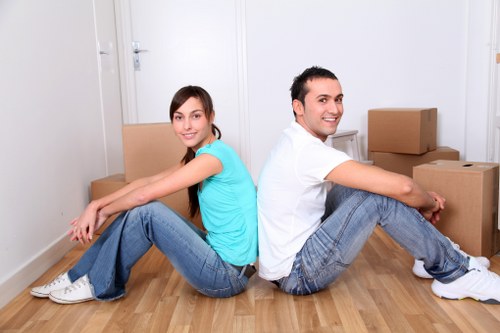 Moving boxes and packing supplies ready for a Clapham home move